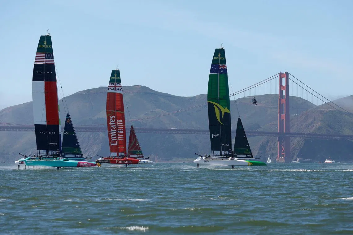The US team races against the British team and the Australian team on day 2 of the San Francisco SailGP on March 23, 2025 in California. The Australian boat's wing collapsed.
