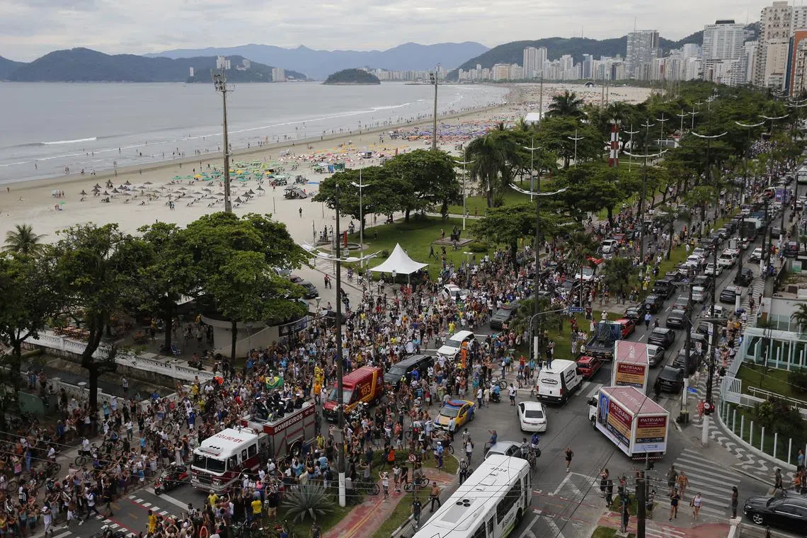 The casket of Brazilian soccer legend Pele is transported by the fire department from his former club Santos' Vila Belmiro stadium to Santos' Memorial Cemetery, Santos, Brazil, Jan 3, 2023.