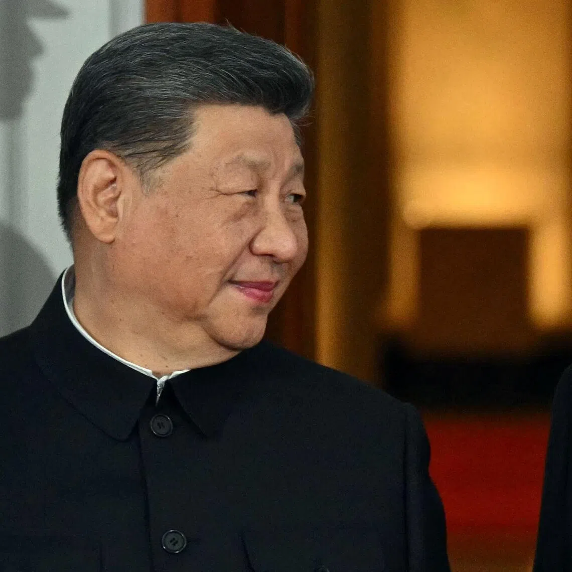 China’s President Xi Jinping and US President Donald Trump speak on the North Portico steps of the White House ahead of a State Dinner in Washington, DC, on Sept 24.