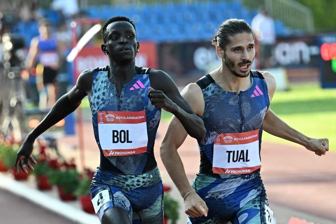 Australia's Peter Bol (left) was provisionally suspended in January after testing positive in an out-of-competition urine test last October.