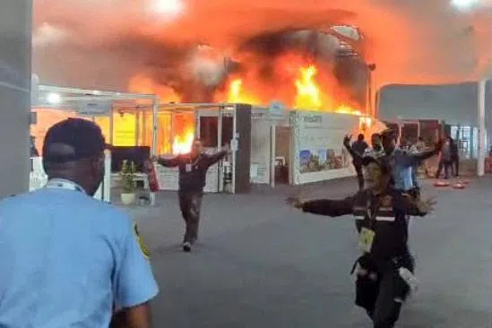 A video screen grab shows emergency crews battling a fire that broke out at a pavilion inside the venue of the COP30 UN Climate Change Conference in Belem, Brazil, on Nov 20.