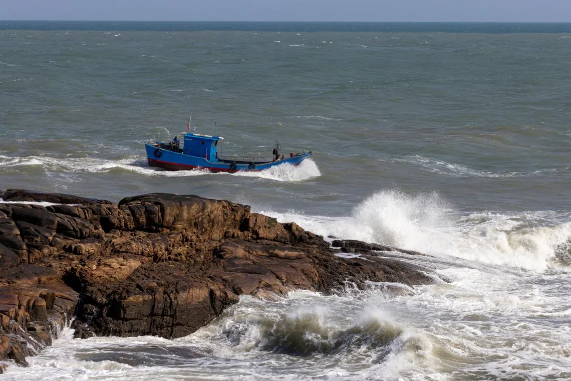 FILE PHOTO: A Chinese fishing boat sails across the Taiwan strait off the coast of Pingtan Island, Fujian province, China, April 9, 2023.  REUTERS/Thomas Peter/File Photo
