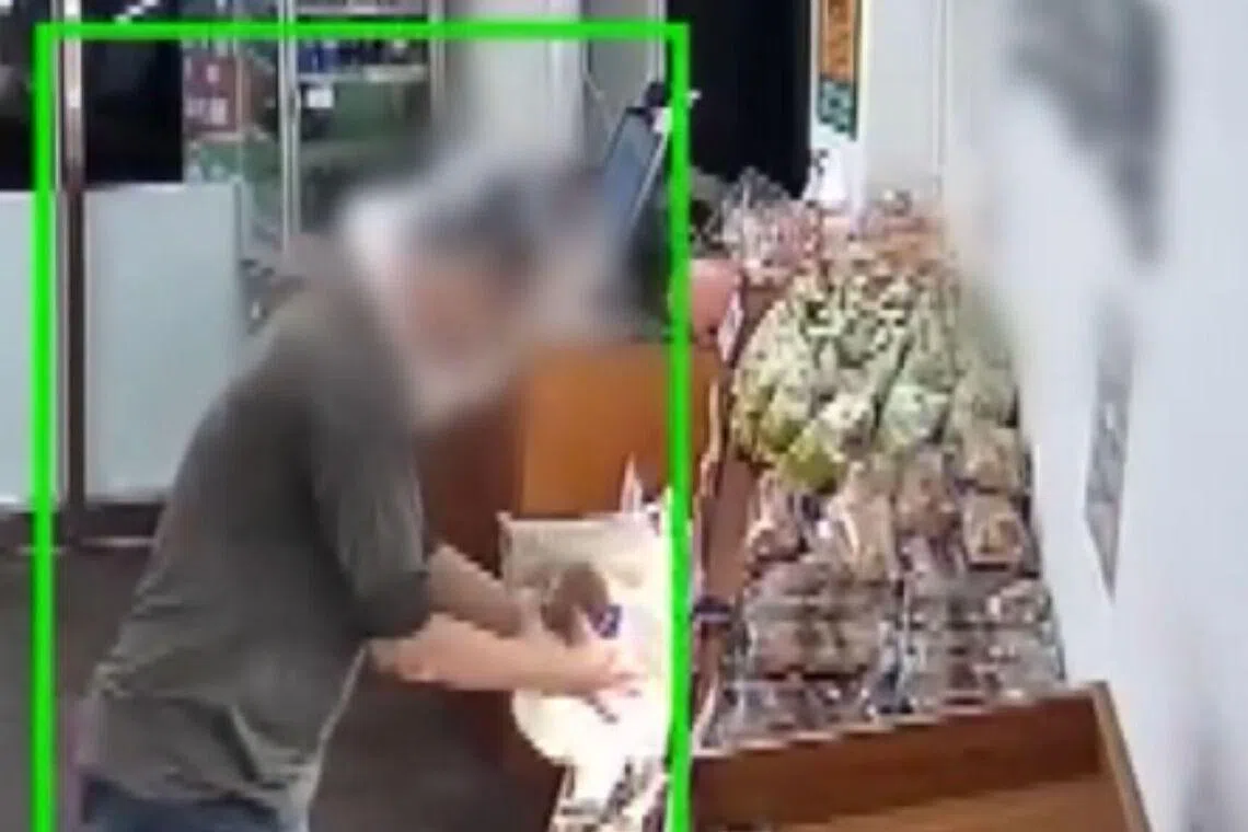 The man entered the bakery at about 11.20pm on May 16 wearing a plastic bag pulled tightly over his head with eye holes cut into the front.