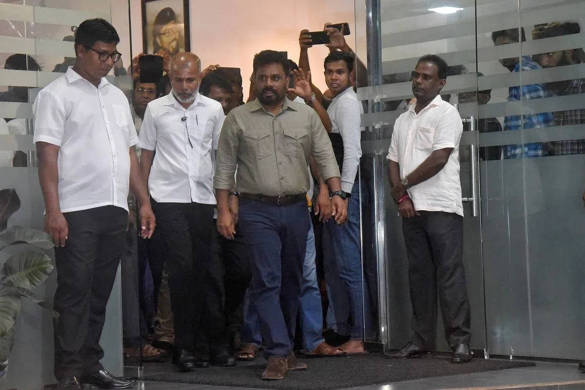 Mr Anura Kumara Dissanayake, Sri Lanka's new President from the National People's Power party, leaves his office as he heads to the Election Commission, a day after the presidential election, in Colombo, Sri Lanka, on Sept 22, 2024. 