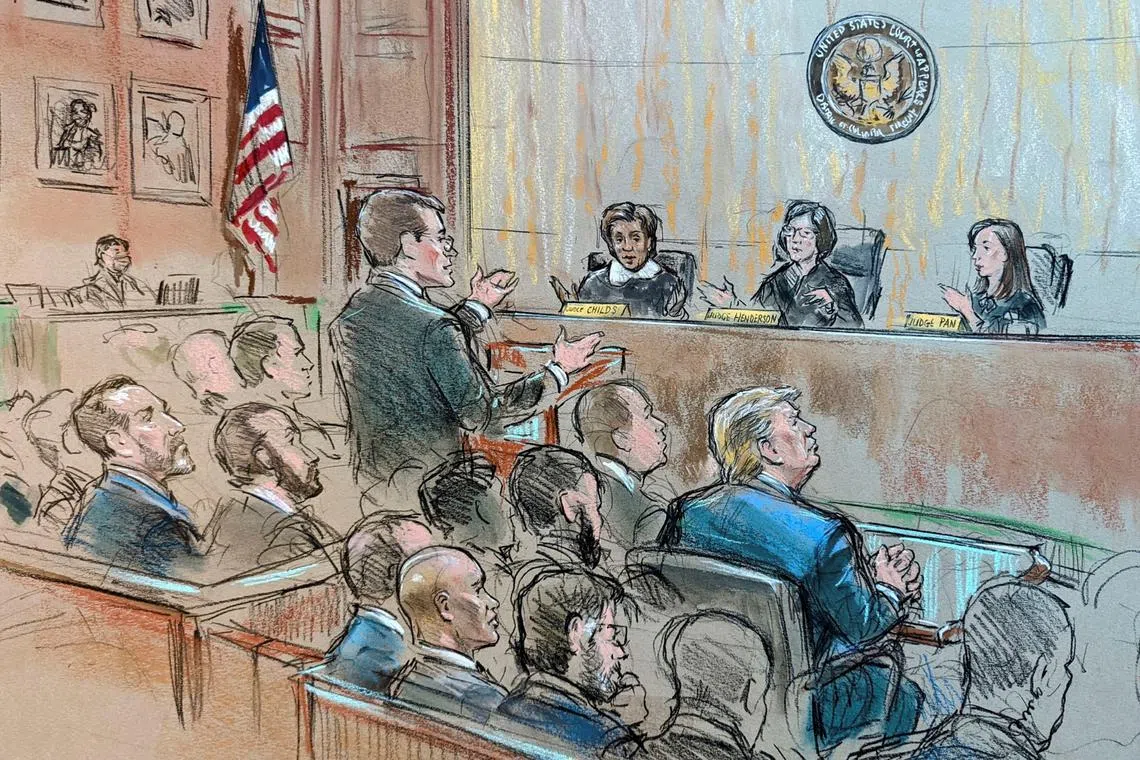 Former US President Donald Trump is seen as Justice Department special counsel Jack Smith speaks during an appeals hearing.