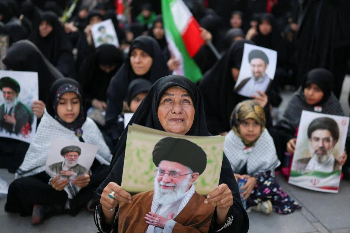 People gather on the day of a public farewell ceremony to pay their respects to late Supreme Leader Ayatollah Ali Khamenei, who was killed on February 28 in Israeli and U.S. airstrikes, at the Imam Khomeini Grand Mosalla, in Tehran, Iran July 4, 2026.  REUTERS/Mohammed Salem