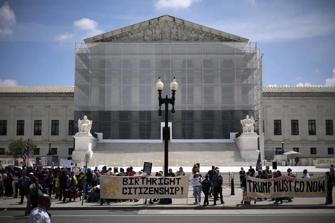 Activists demonstrate during a protest outside the US Supreme Court on May 14.