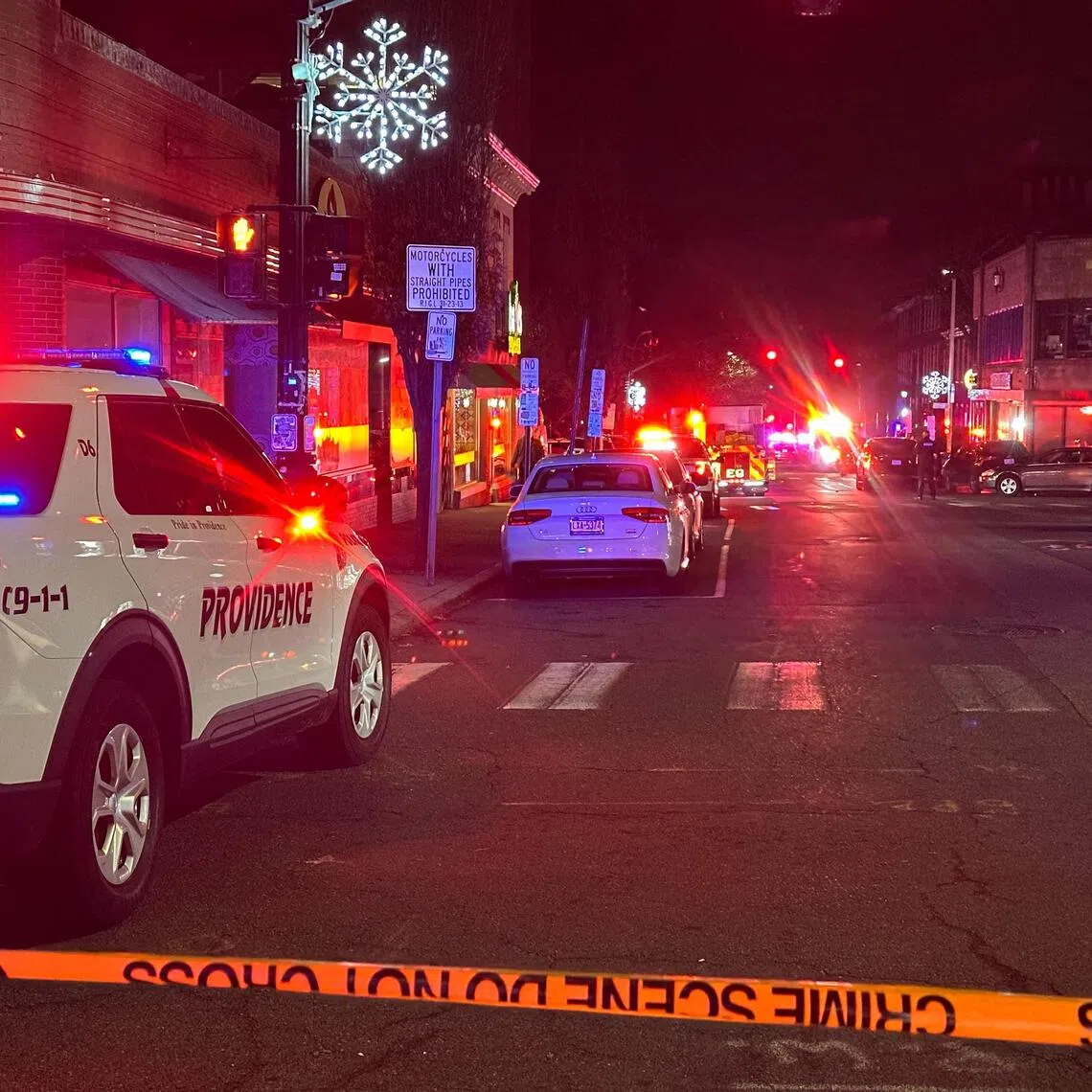 A police vehicle stands near the site of a mass shooting reported by authorities at Brown University in Providence, Rhode Island, on Dec 13, 2025.