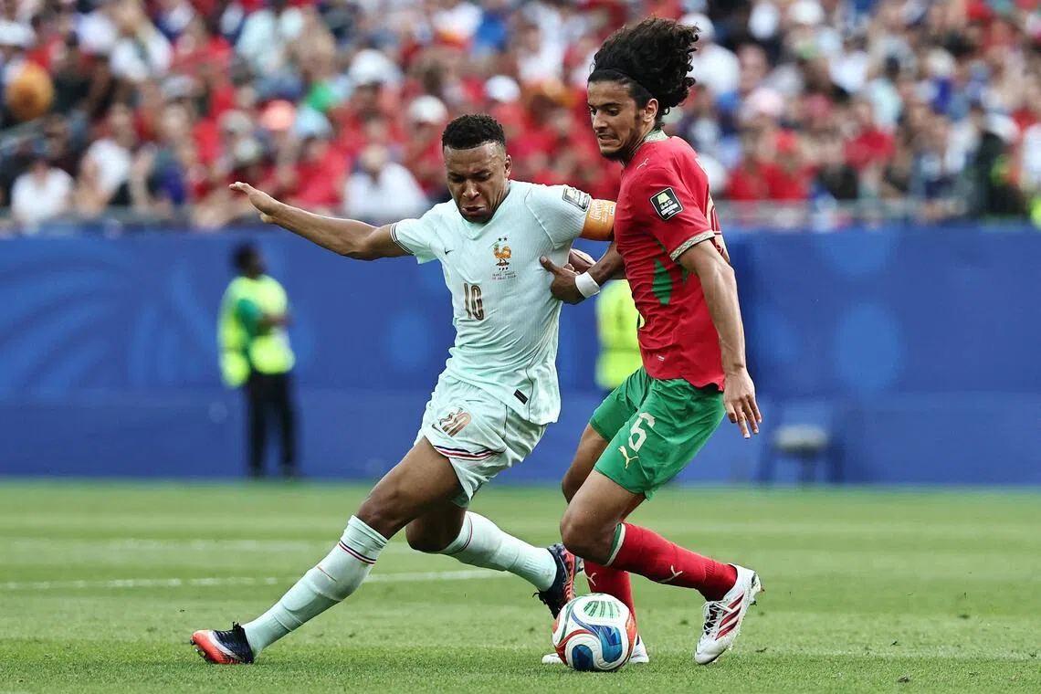 Morocco’s Ayyoub Bouaddi holding off France’s Kylian Mbappe in their World Cup quarter-final on July 9, 2026. He has joined Manchester City from Lille.