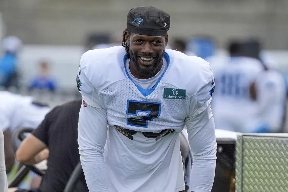 FILE PHOTO: Jul 30, 2024; Charlotte, NC, USA; Carolina Panthers linebacker Jadeveon Clowney (7) smiles at Carolina Panthers Practice Fields. Mandatory Credit: Jim Dedmon-USA TODAY Sports/File Photo