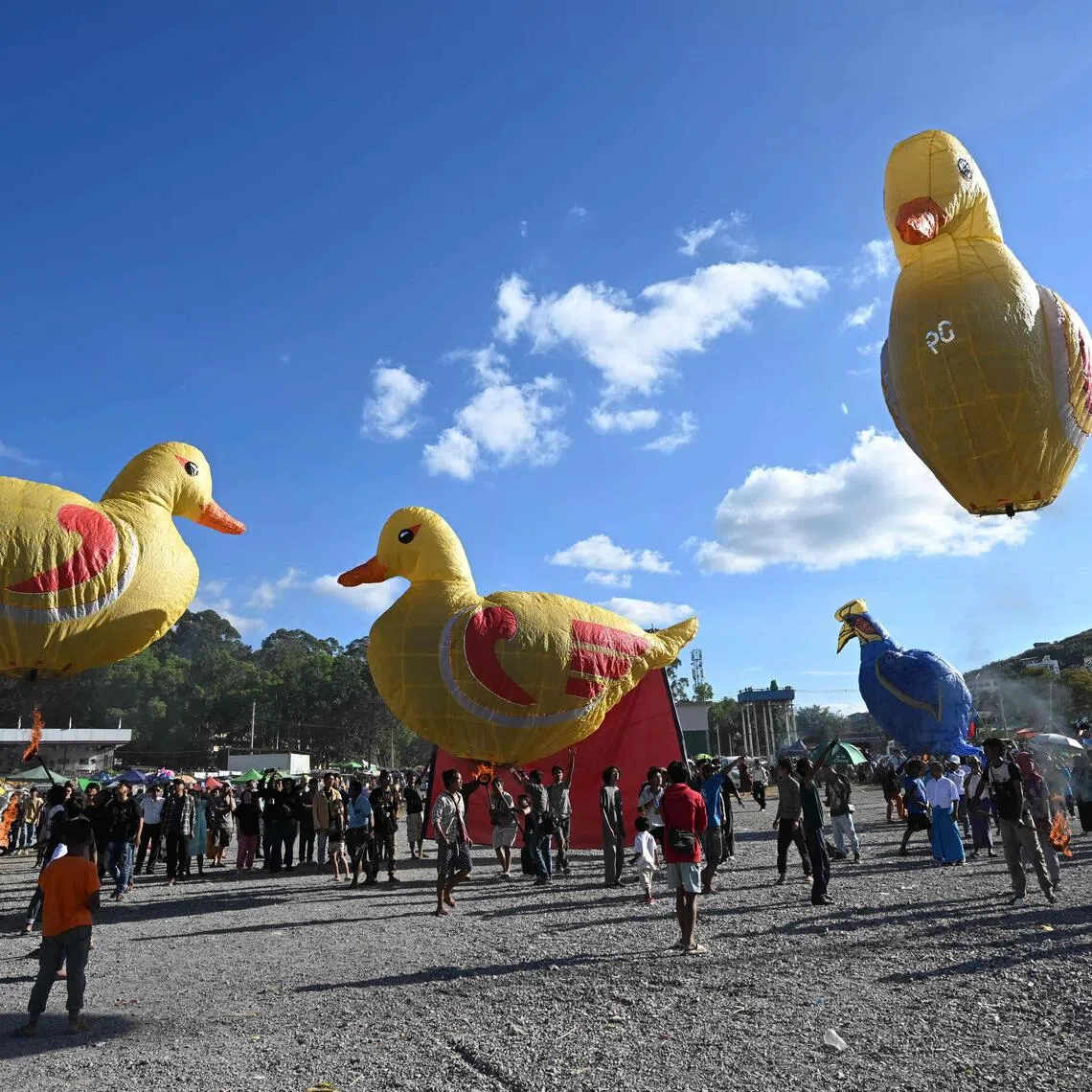 Bird-shaped hot-air balloons are released during the Tazaungdaing Lighting Festival in Taunggyi in Myanmar's north-eastern Shan State on Oct 31. 