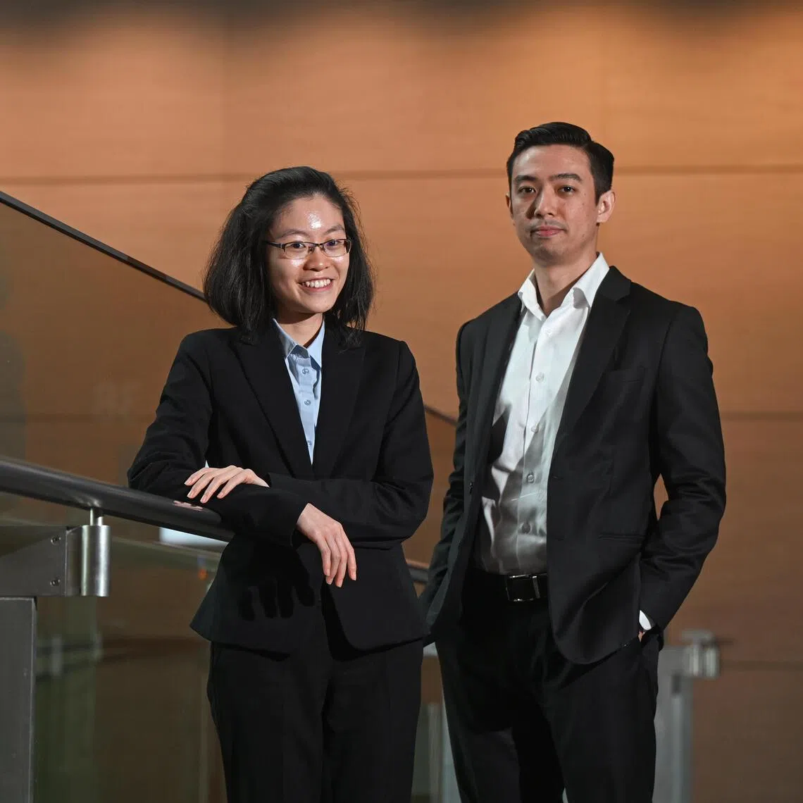 Lawyers Iris Ng (left), 30, from Helmsman and Jonathan Trachsel (right), 34, from Allen & Gledhill, who were appointed under the Young Independent Counsel (YIC) scheme, on Oct 2.