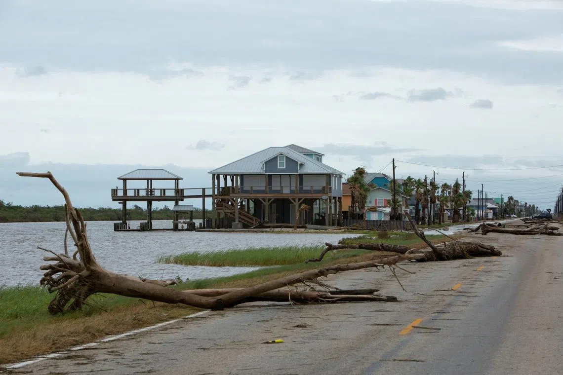Debris covers a road after Hurricane Beryl moved through the area in Matagorda, Texas.
