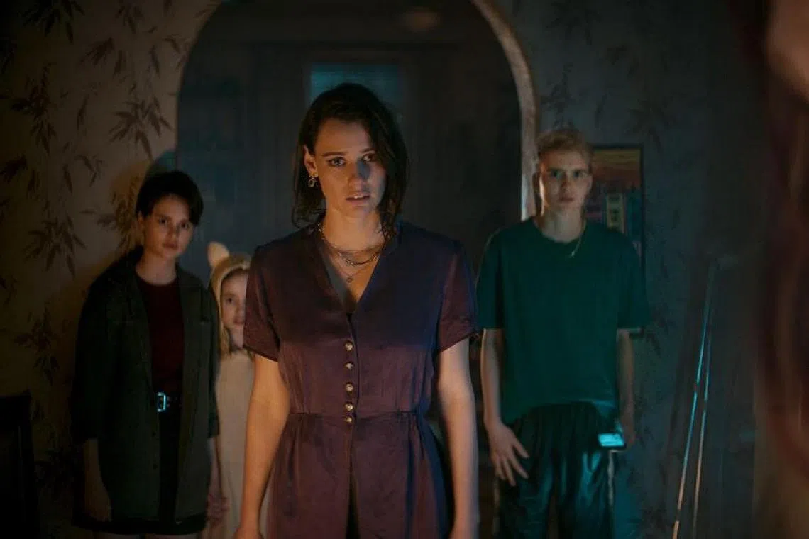 Lily Sullivan (centre) in Evil Dead Rise.