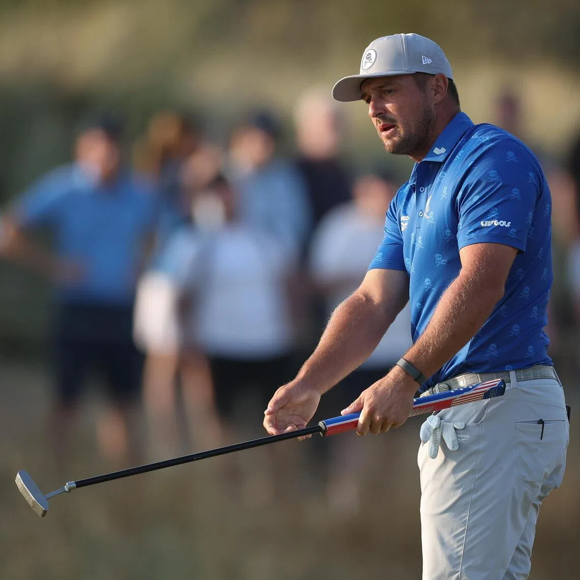 Bryson DeChambeau suffered a two-stroke penalty after R&A officials deemed he had inadvertently improved the area of his intended swing on the fifth hole in the British Open second round.
