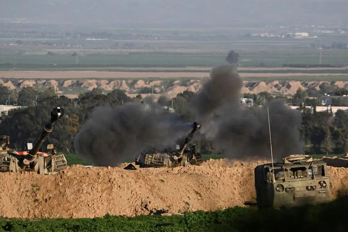 An Israeli mobile artillery unit fires towards Gaza, amid the ongoing conflict between Israel and the Palestinian Islamist group Hamas, near the Israel-Gaza border, in Israel, February 1, 2024. REUTERS/Dylan Martinez