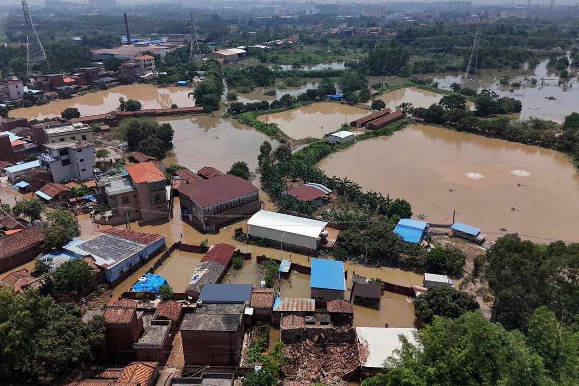 A drone view shows flooded houses and fish farms after days of heavy rainfall, in Qingyuan, Guangdong province, China August 8, 2025. REUTERS/Florence Lo