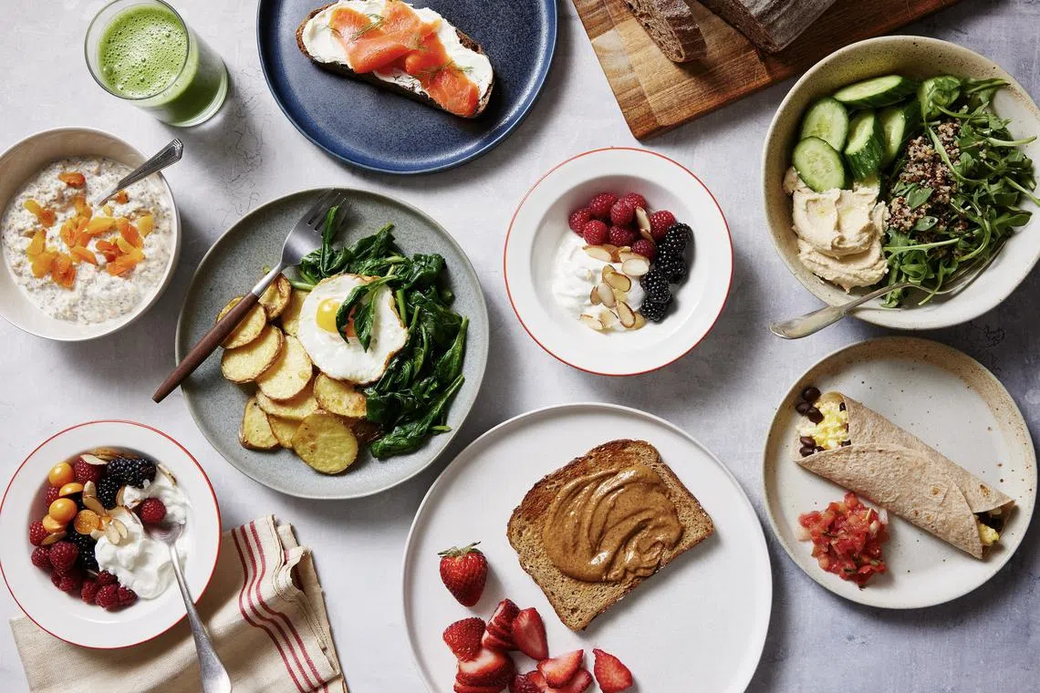 Several healthy breakfasts on a tabletop in New York, April 18, 2023. The ideal breakfast is the one that makes you feel your best, experts say, though there are some important nutrients to keep in mind. 