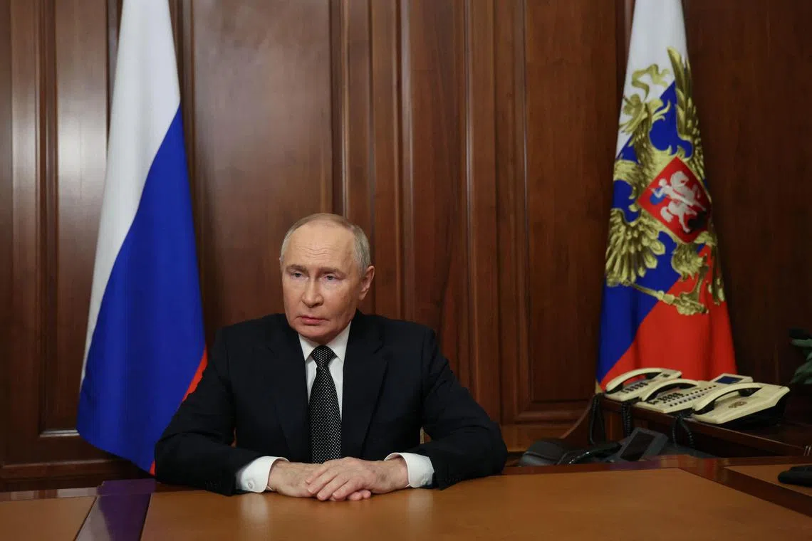 Russian President Vladimir Putin delivering a televised address from Moscow on Nov 21.