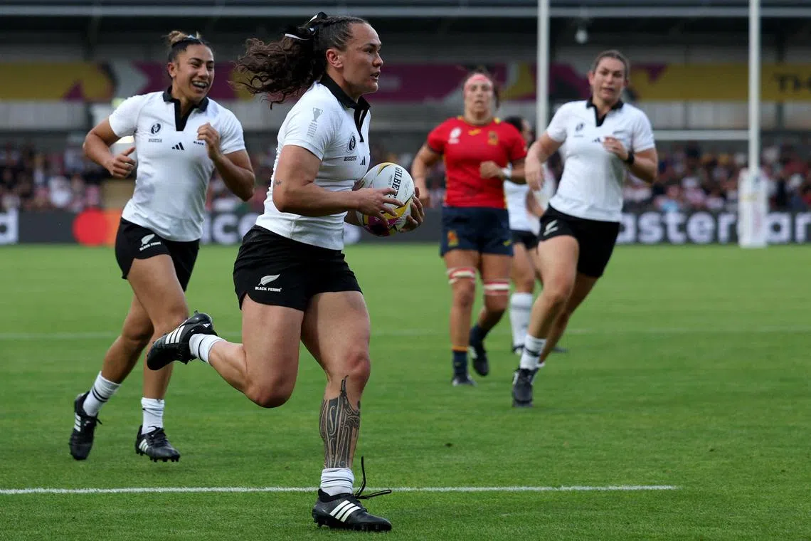 New Zealand's Portia Woodman-Wickliffe running with the ball to score a try during the 54-8 Women’s Rugby World Cup Pool C win over Spain on Aug 24.