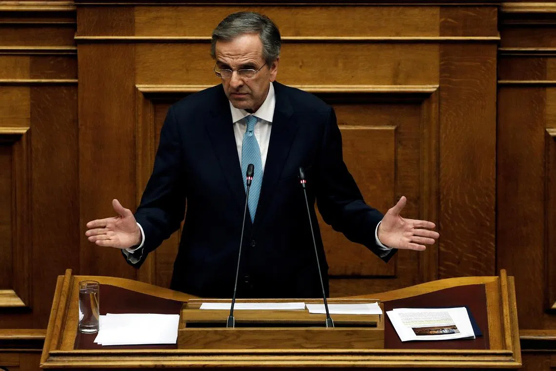 FILE PHOTO: Former Greek Prime Minister Antonis Samaras addresses lawmakers during a parliamentary session in Athens, Greece, February 21, 2018. REUTERS/Alkis Konstantinidis/ File Photo