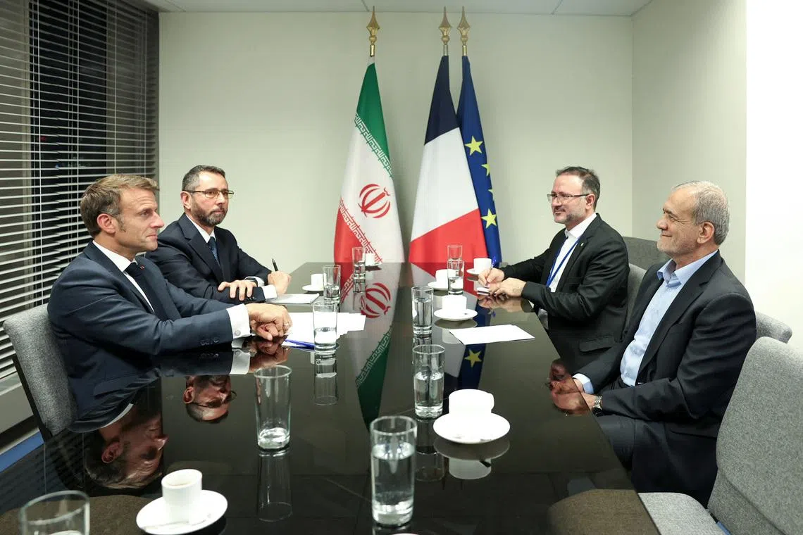 Iran's President Masoud Pezeshkian meets with France's President Emmanuel Macron in New York City, U.S., September 24, 2024. Iran's Presidency/WANA (West Asia News Agency)/Handout via REUTERS