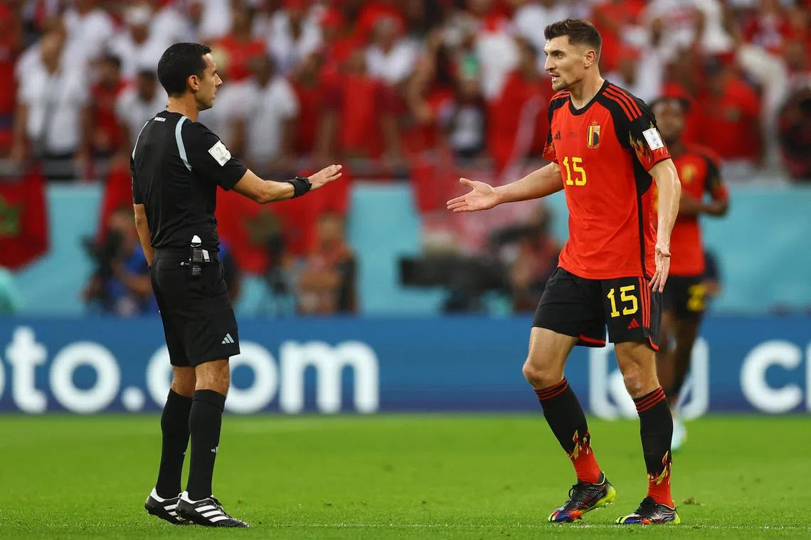 FILE PHOTO: Soccer Football - FIFA World Cup Qatar 2022 - Group F - Belgium v Morocco - Al Thumama Stadium, Doha, Qatar - November 27, 2022 Belgium's Thomas Meunier remonstrates with referee Cesar Arturo Ramos REUTERS/Kai Pfaffenbach/File Photo