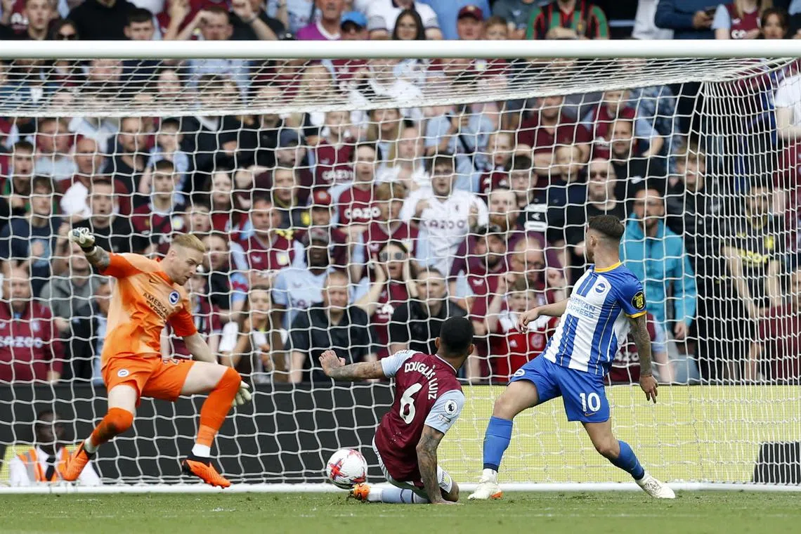 Aston Villa's Douglas Luiz scores their first goal.