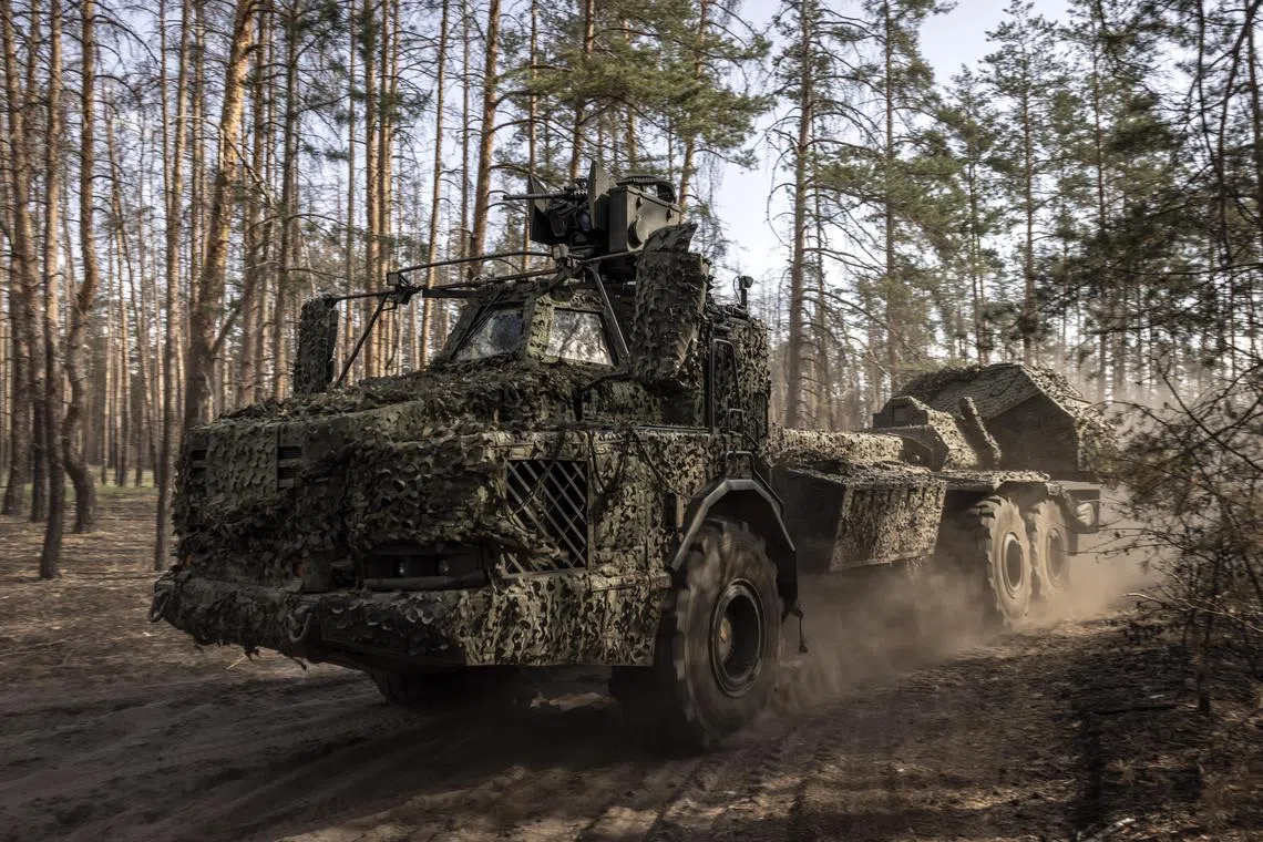 Ukrainian soldiers operating a Swedish-supplied  howitzer in Ukraine’s northeastern Kharkiv Region, on June 3.