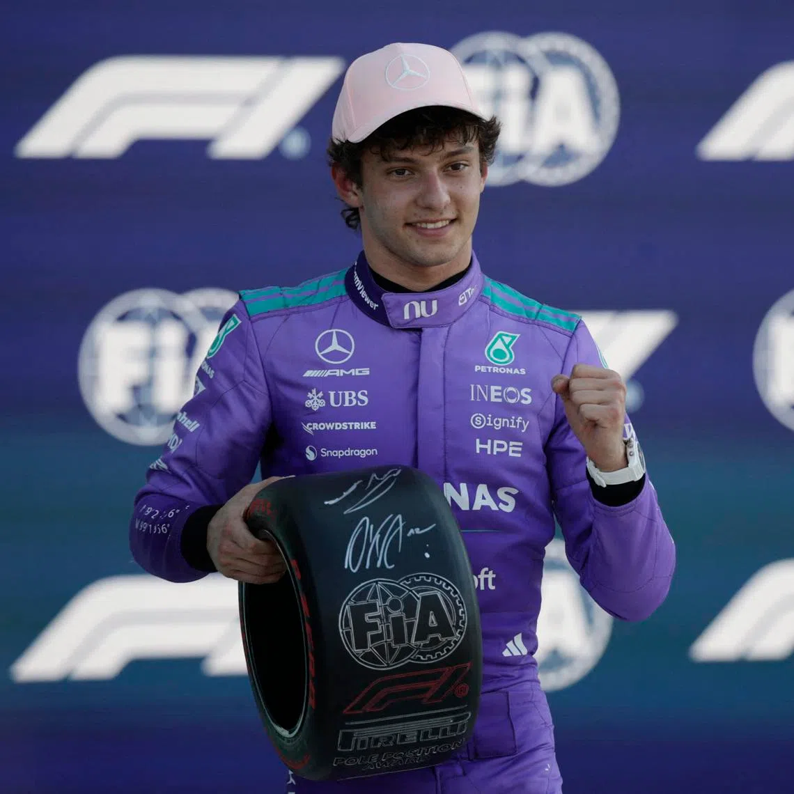 Formula One F1 - Miami Grand Prix - Miami International Autodrome, Miami, Florida, United States - May 2, 2026  Mercedes' Andrea Kimi Antonelli celebrates on the podium after qualifying in pole position REUTERS/Brian Snyder
