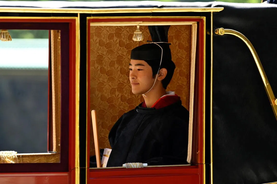 Japan’s Prince Hisahito sits inside a horse-drawn carriage as he departs the Imperial Palace after attending his coming-of-age ceremony, in Tokyo, Japan, on Sept 6, 2025.