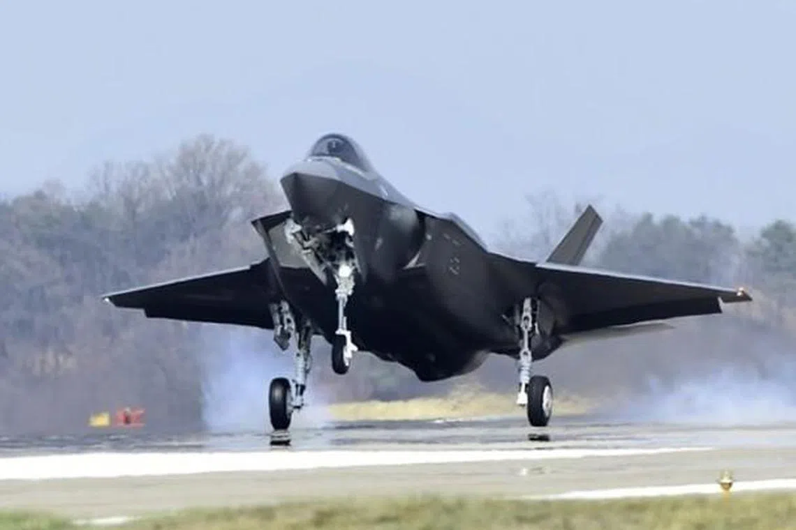 Unidentified drones were spotted over three US Air Force bases in England.