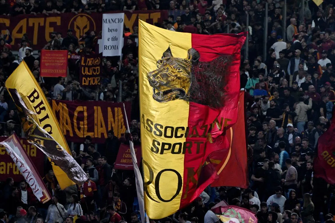 FILE PHOTO: Soccer Football - Serie A - AS Roma v Juventus - Stadio Olimpico, Rome, Italy - May 5, 2024  AS Roma fans with flags before the match REUTERS/Alberto Lingria/File Photo