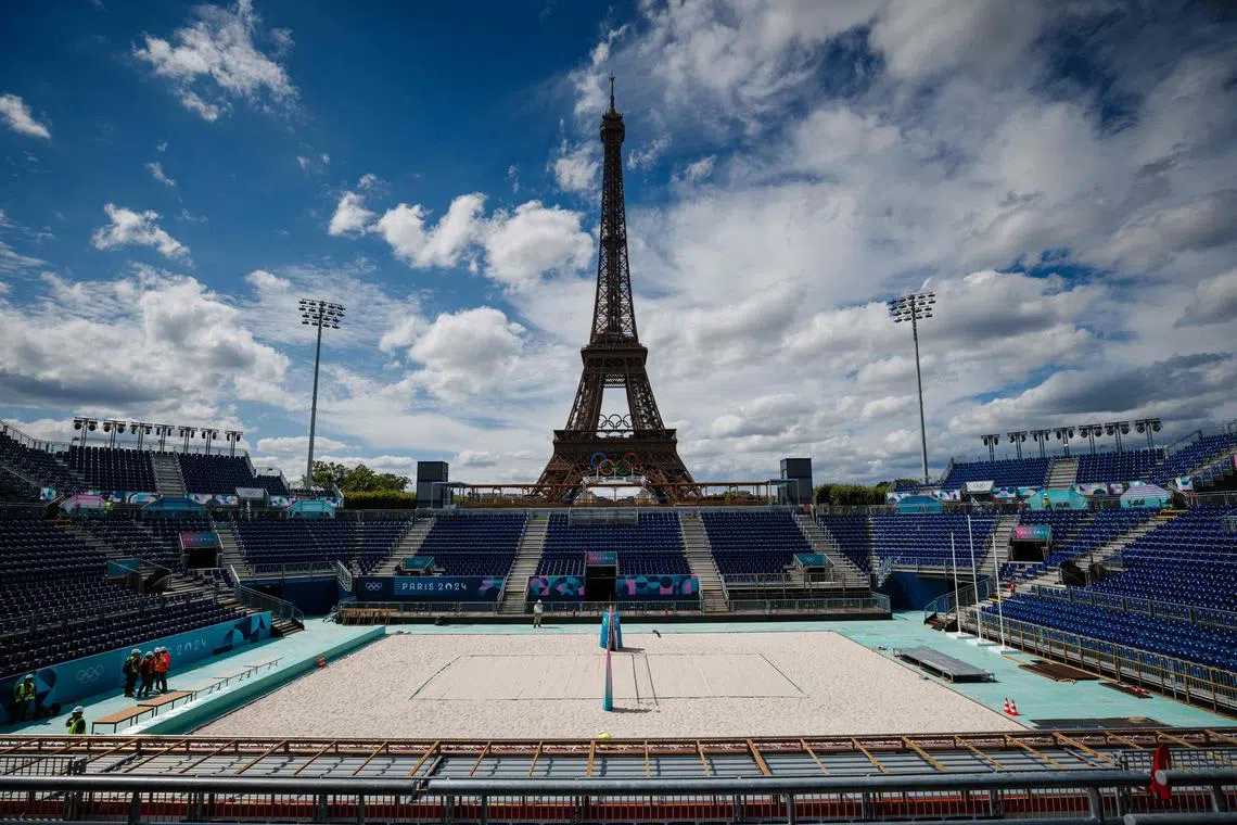 The park behind the Eiffel Tower, where the beach volleyball is set to take place, is a popular picnic spot – and previously rat infested.