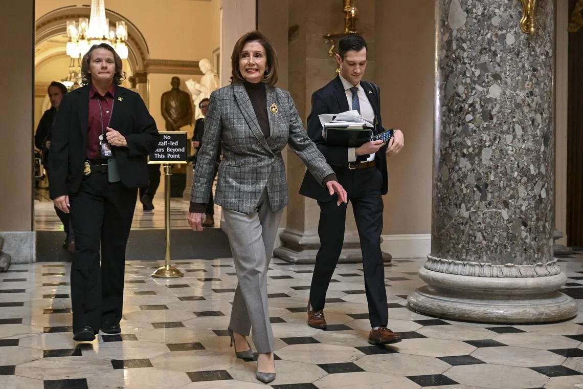 House Speaker Nancy Pelosi walks to her office after leaving the House floor at the Capitol, on Dec 23, 2022. 
