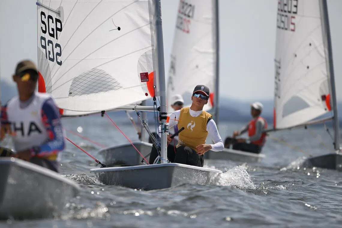Ian Goh (centre) of Singapore in action during the Asian Games Boys? Dinghy Final at the Kaiyoh Yacht Harbour on Oct 3, 2026.