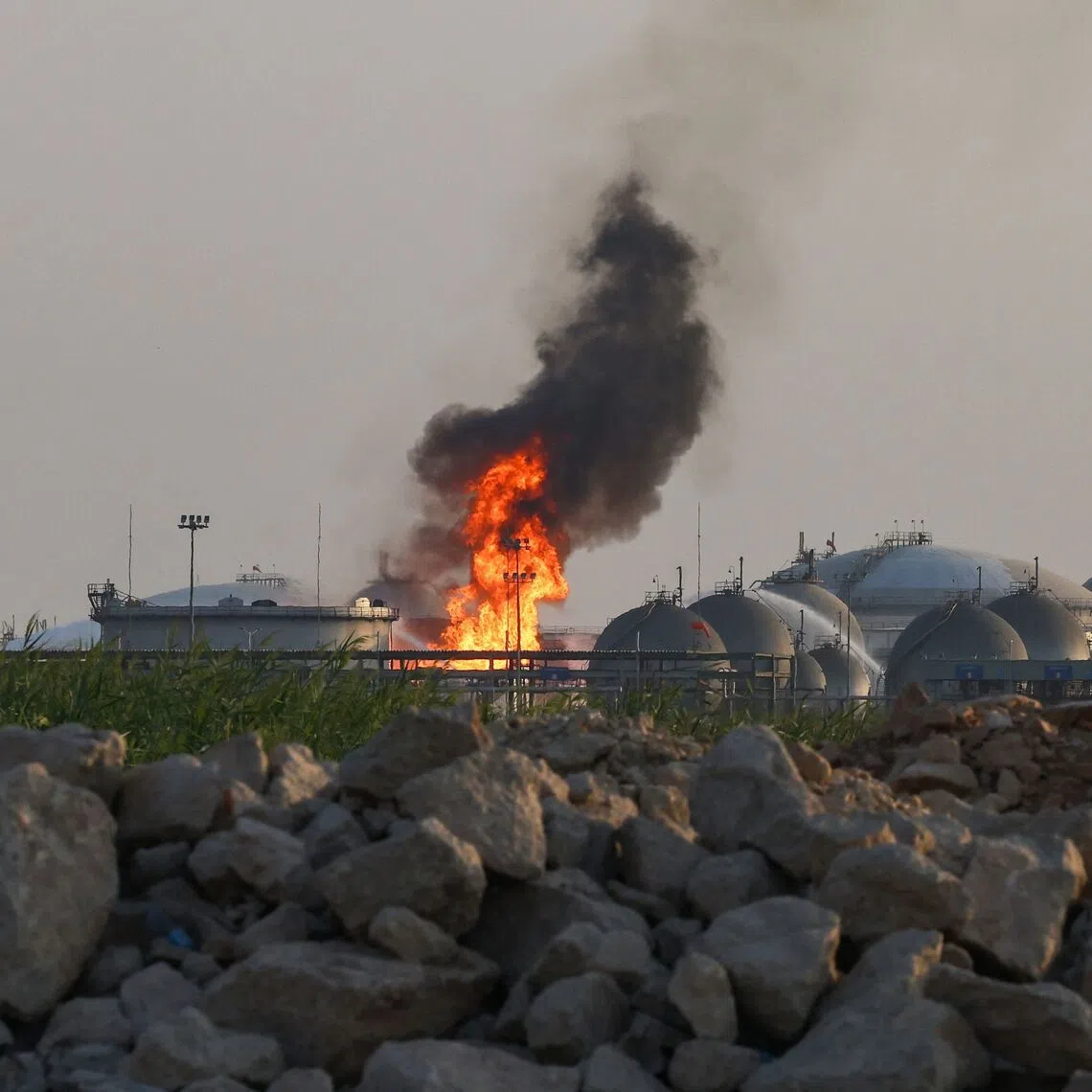 Flames burning at a facility belonging to Saudi oil giant Aramco south of Riyadh on Oct 3, following attacks by the Houthis.