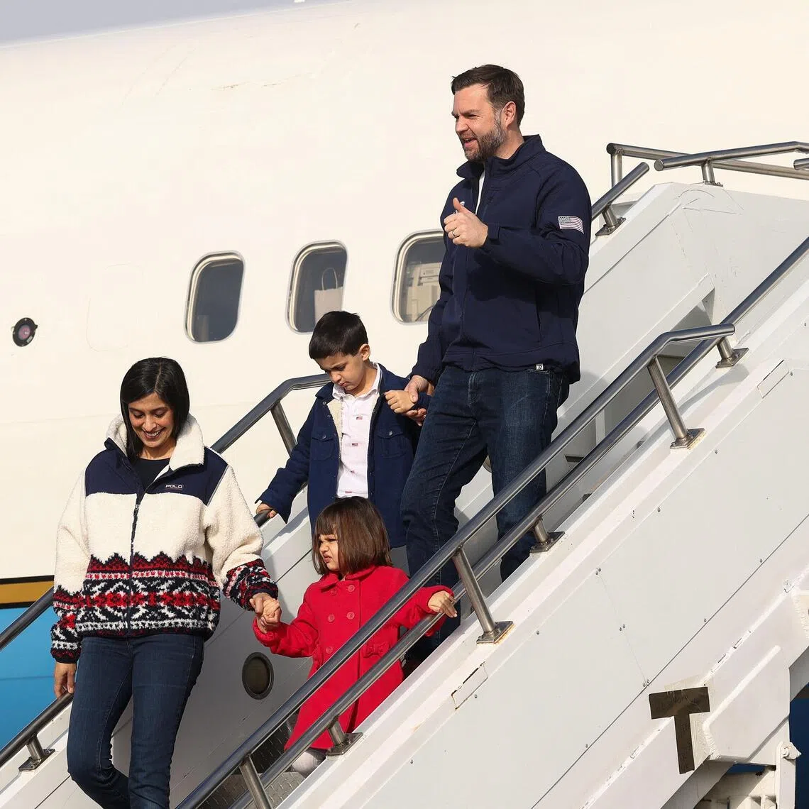 US Vice President JD Vance, second lady Usha Vance, their daughter Mirabel and son Vivek disembark Air Force Two as they arrive ahead of the Milano Cortina 2026 Winter Olympic Games in Milan, Italy, on Feb 5.
