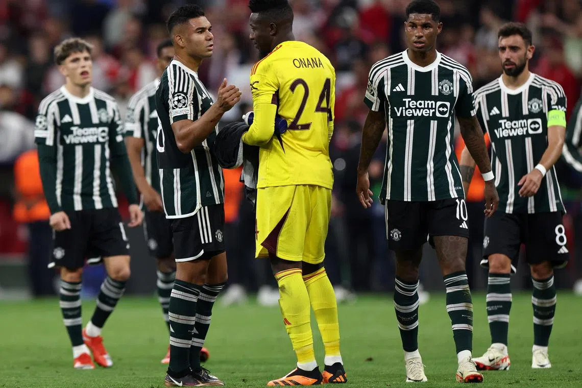 Manchester United midfielder Casemiro consoling goalkeeper Andre Onana following a blunder in the 4-2 Champions League loss to Bayern Munich.
