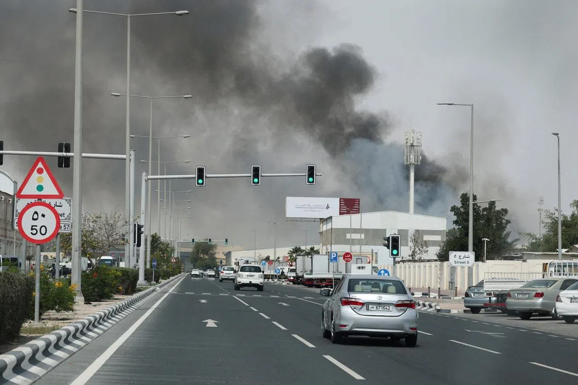 FILE PHOTO: Smoke rises after reported Iranian missile attacks, following United States and Israel strikes on Iran, as seen from Doha, Qatar, March 1, 2026. REUTERS/Mohammed Salem/File Photo