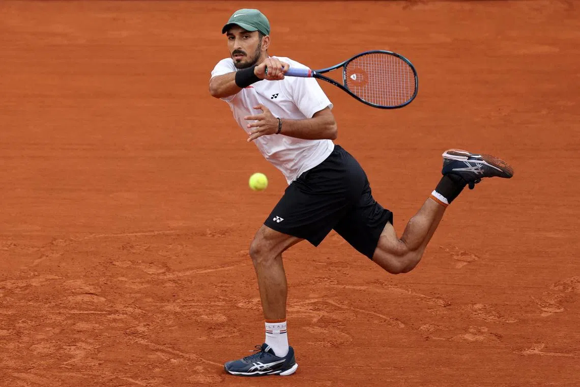 FILE PHOTO: Paris 2024 Olympics - Tennis - Men's Singles First Round - Roland-Garros Stadium, Paris, France - July 27, 2024. Hady Habib of Lebanon in action during his first round match against Carlos Alcaraz of Spain. REUTERS/Claudia Greco/File Photo
