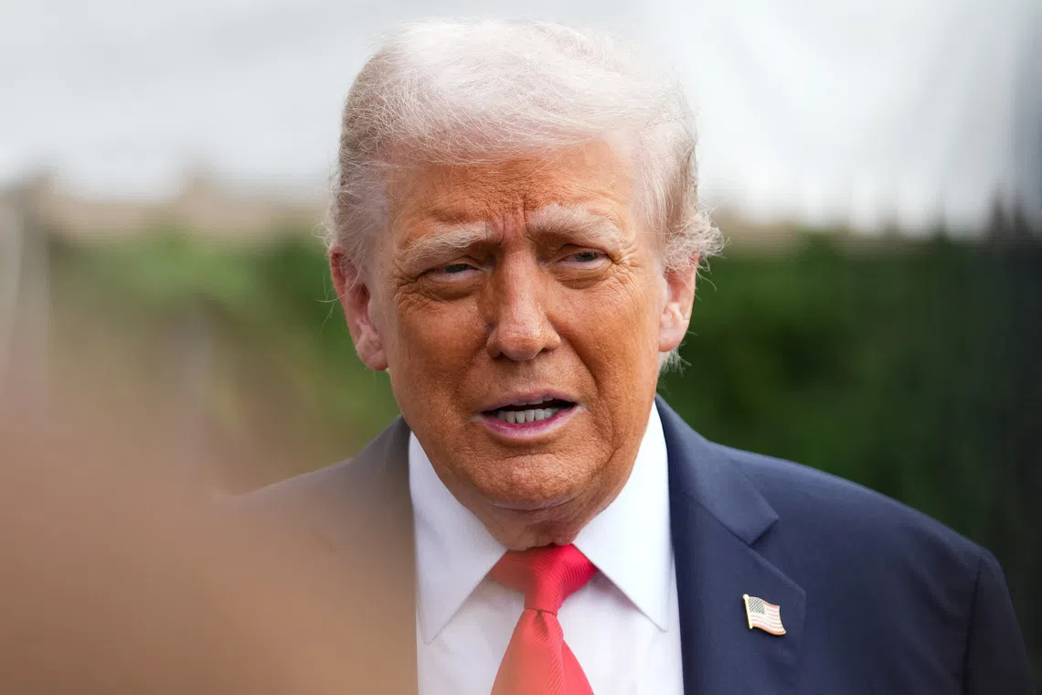 FILE PHOTO: U.S. President Donald Trump speaks to the media before departing for a state visit to Britain, at the White House in Washington, D.C., U.S., September 16, 2025. REUTERS/Ken Cedeno/ File Photo