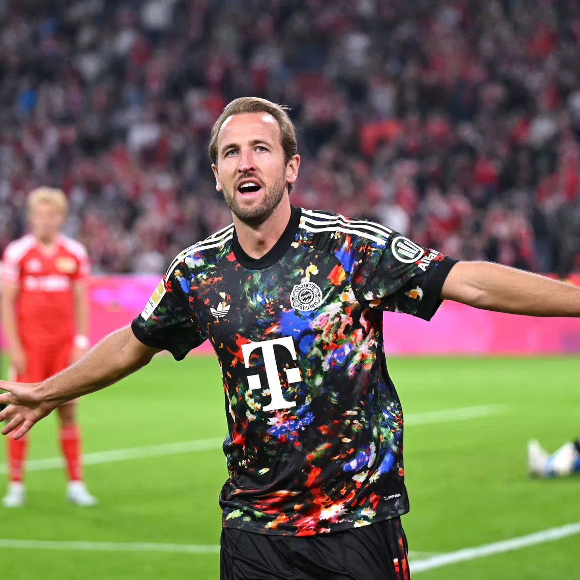 Bayern Munich’s Harry Kane celebrates scoring their fourth goal against Union Berlin.