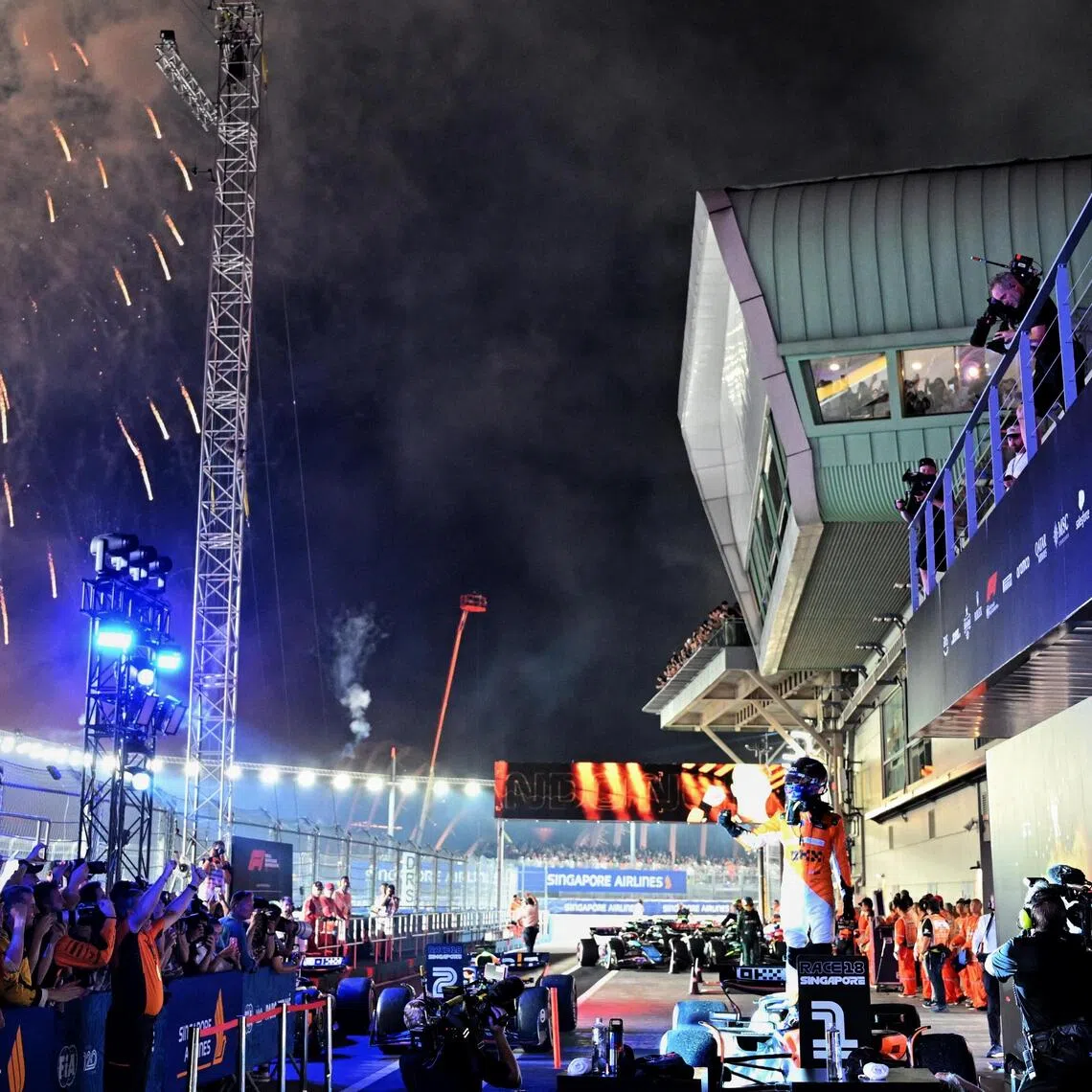 [NOTE: F1 photos are for editorial use only and NOT for sale.]British driver Lando Norris of McLaren F1 Team winning the Formula One Singapore Airlines Singapore Grand Prix at the Marina Bay street circuit on September 22, 2024.
