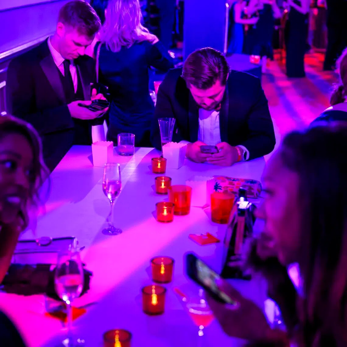 Guests at a party hosted by the newsletter platform Substack reacting to news of gunfire at the White House Correspondents Association dinner on April 25, 2026.