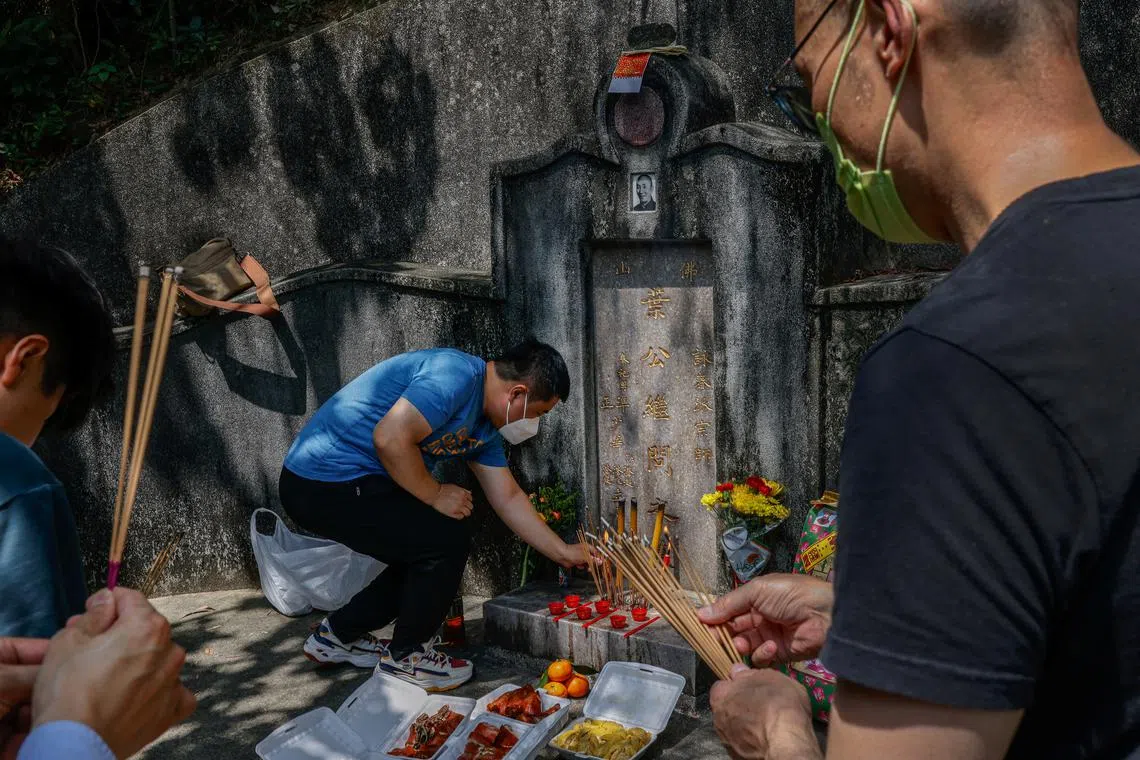Wing Chun students paying their respect at the tomb of grandmaster Ip Man on April 16. 