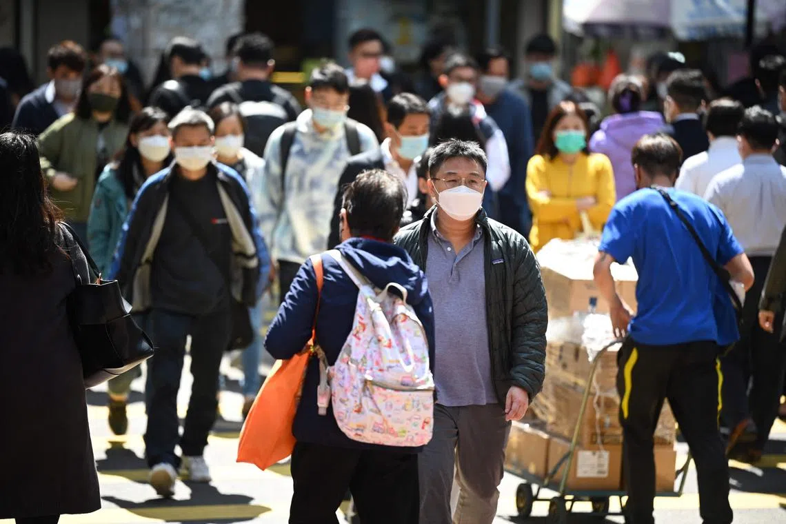 Most people appear to be wearing masks in the streets and on public transportation on Wednesday. 