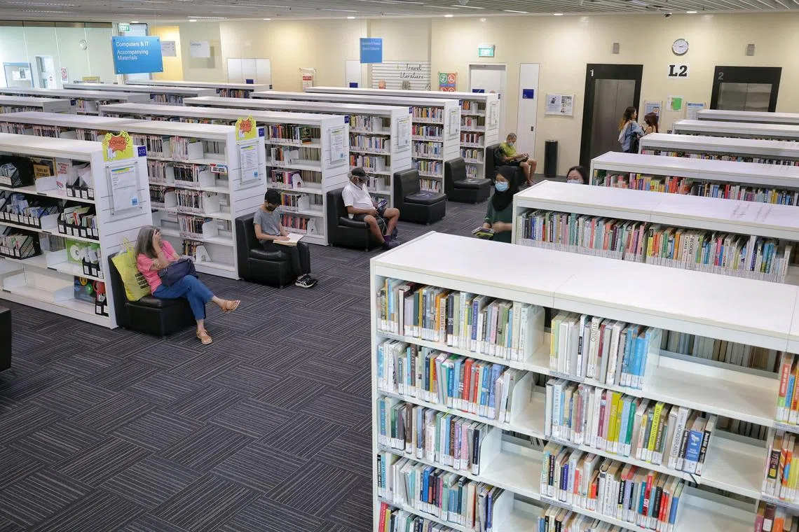 Seats, which are neatly aligned with bookshelves, for patrons at Bishan Public Library on Sept 25, 2024.