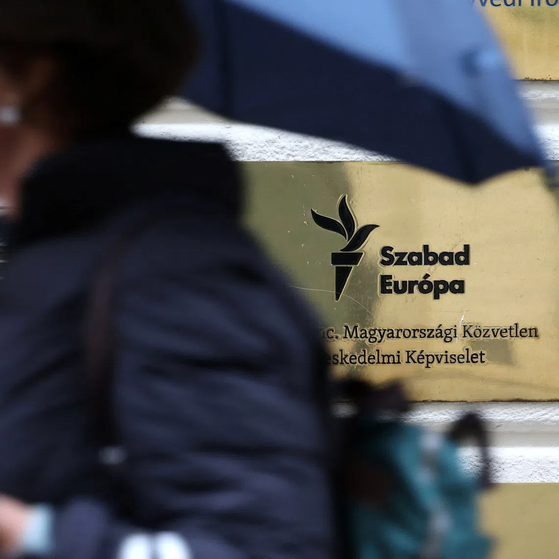 The logo of U.S.-funded Radio Free Europe/Radio Liberty (RFE/RL) at its headquarters, as it will shutter its Hungarian operations on Friday, ending a five-year run of a media service in Budapest, Hungary, November 21, 2025. REUTERS/Bernadett Szabo