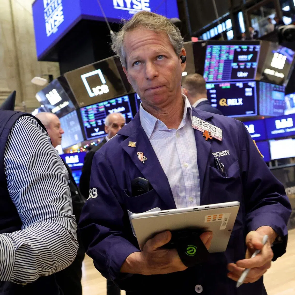 Traders working on the floor of the New York Stock Exchange on Dec 3.